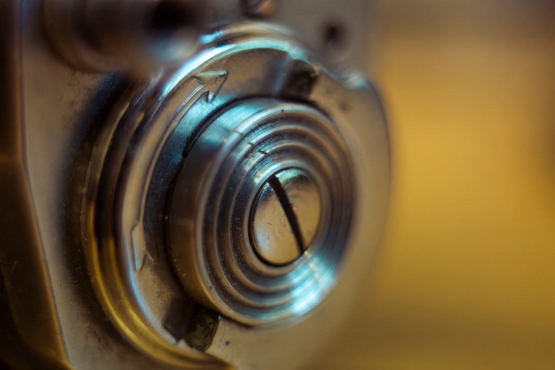 Close-up of a metal screw with concentric circles