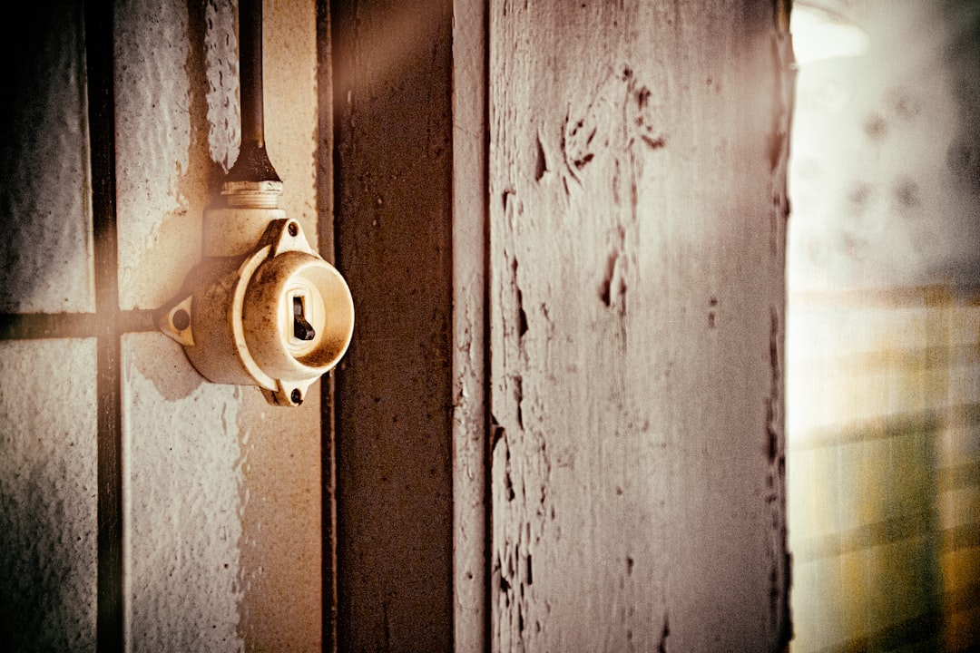 white wooden door with door lever
